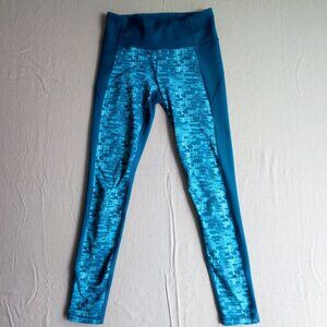 Under Armour Active wear leggings women's size 6 ? teal colour geometric pattern